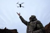 Ukrajinský voják s dronem