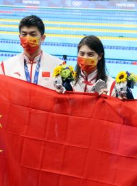 Čínští plavci během olympijských her v Tokiu v roce 2021